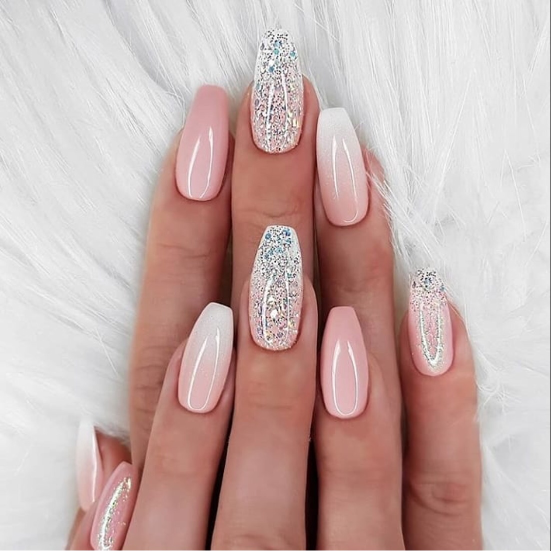 Beautiful finger nails in pink sparkle design
