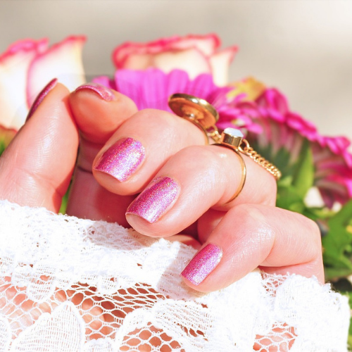Wedding hands with pink nails